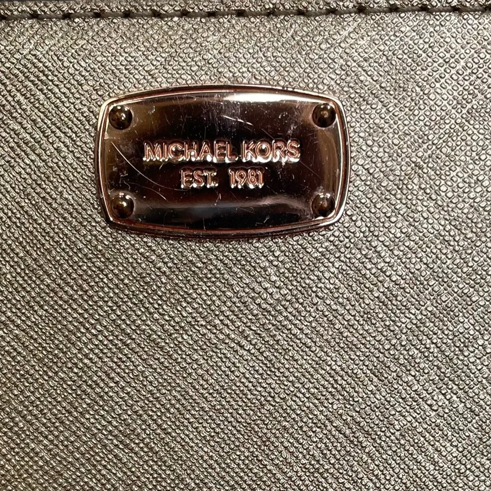 Michael Kors Gold Wristlet Wallet with Rose Gold features- Jet‎ Set